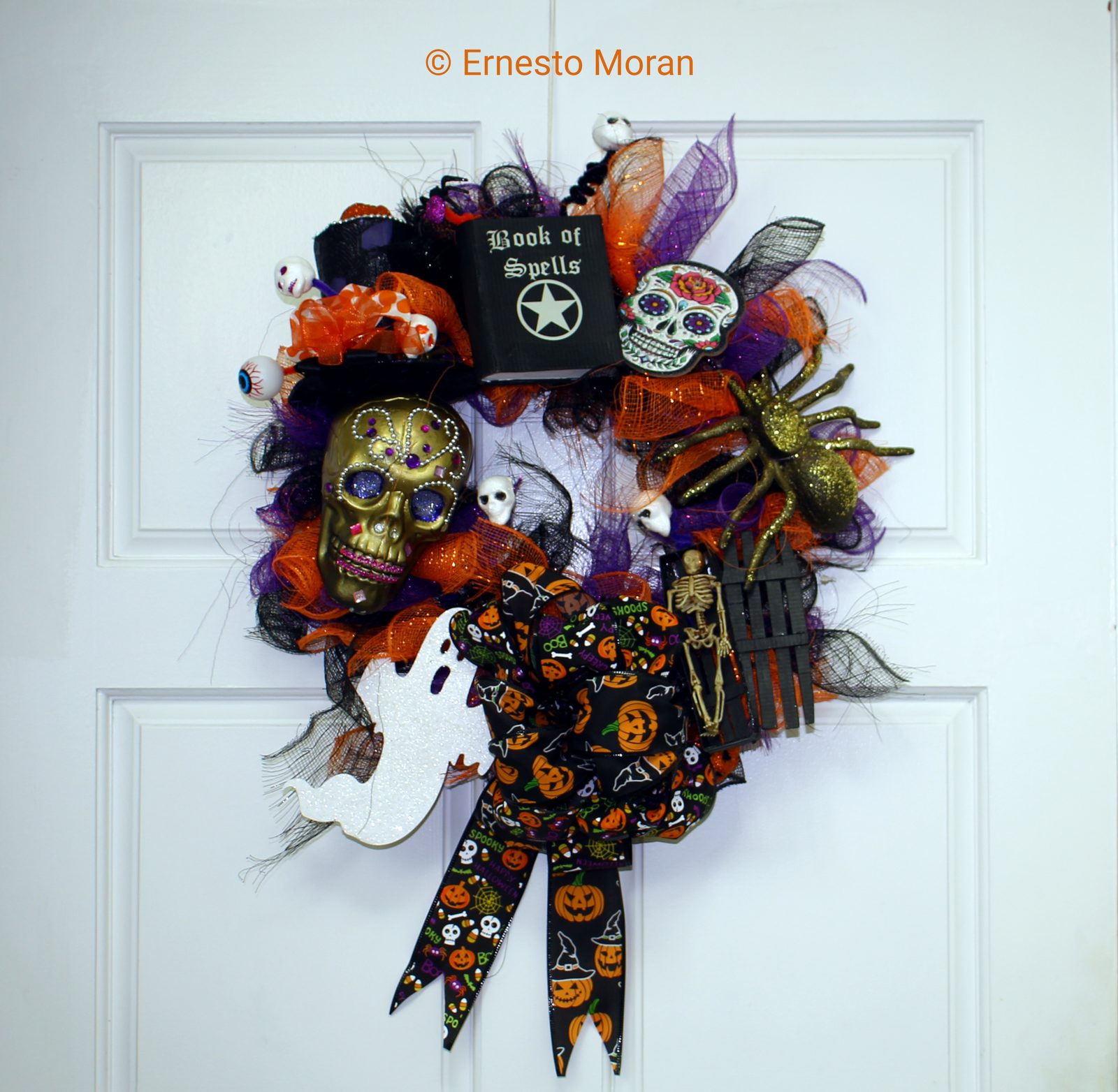 Halloween wreath with glitter ghost and spooky ribbon